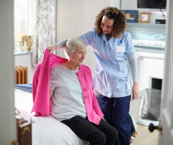 Nurse helping a woman